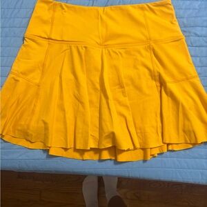 Gold Mini Skater Skirt with Tiered Design